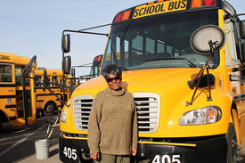 Janice Batiste_in front of bus