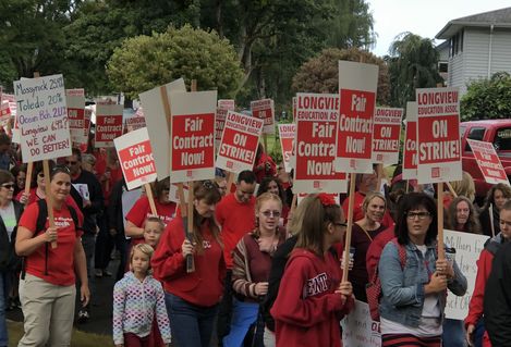 Longview EA strike rally members march