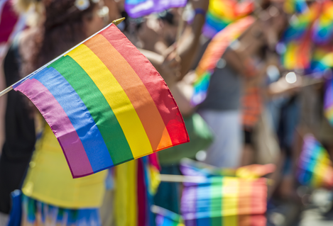 Rainbow pride flag waving at parade