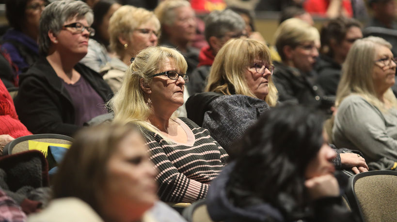 Yakima community members sit in an auditorium during a recent community forum about school finances and district priorities.